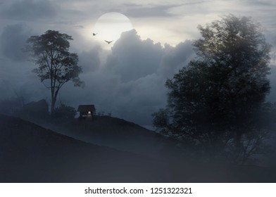 A Small House On The Mountain At Night