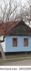 Small house with two windows  in front