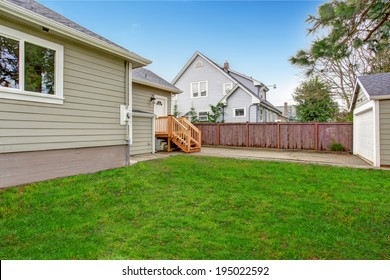 Small House With Wooden.deck. Backyard View