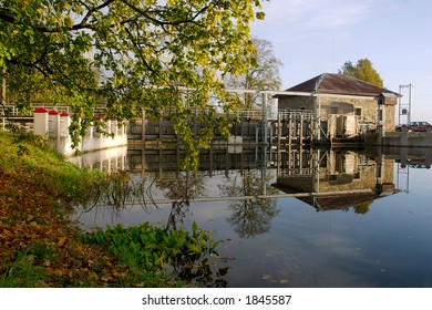 Small Hydro Power Station In Quiet Country Landscape