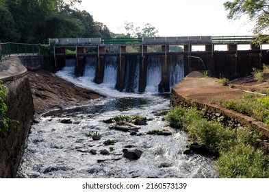 Small hydroelectric power plant dam landscape in Londrina city park, Parana, Brazil, 2022.