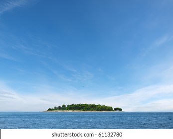 Small Island In Adriatic Sea Near Small Town Rovinj