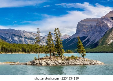 Small island on Lake Minnewanka in Banff National Park, Canada - Powered by Shutterstock