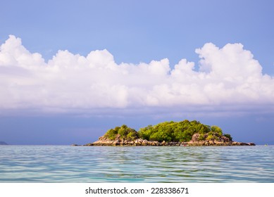 Small Island In Tropical Sea