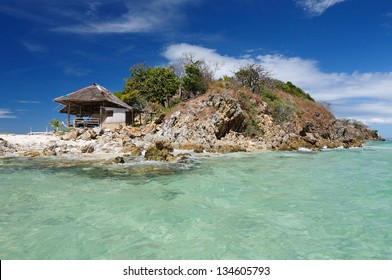 Small island in the turquoise sea