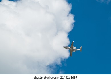 Small Jet Private Airplane With Sky Background Taking Off