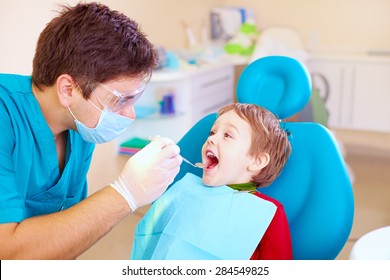 Small Kid, Patient Visiting Specialist In Dental Clinic