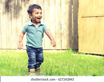 A small kid playing in garden