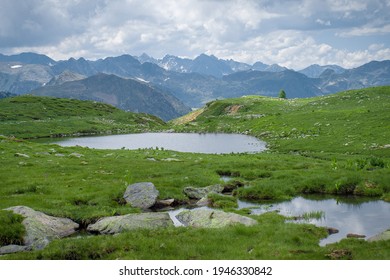 Small Lakes Among The Grass. French Alps.