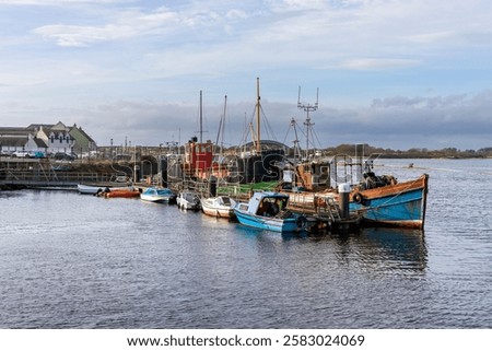 Similar – Image, Stock Photo Fishing boat moored in ocean water