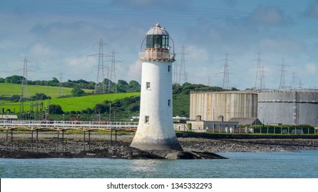 A Small Lighthouse In The River Bank In Killimer Ireland. Killimer Is A Village In County Clare Ireland In A Civil Parish Of The Same Name