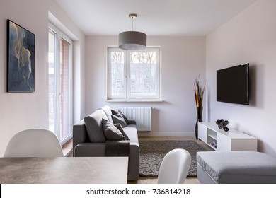 Small Living Room With Table, Couch And Television