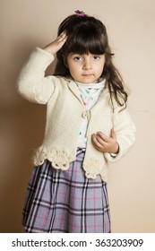 Small Lovely Iraqi Girl Baby Isolated On Off White Background