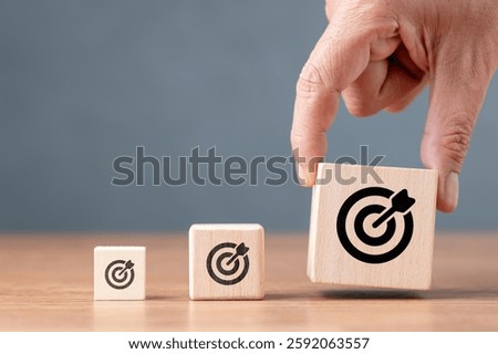 Small, medium, and big target, hand select the biggest target in a row, business and marketing, or skill development, and challenges