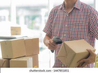 Small And Medium Enterprises, SME, People Working At Home Who Owned Small Online Shopping Business Checking Cardboard Box For Customer