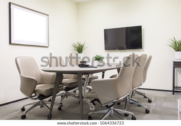 Small meeting room with\
leather seats