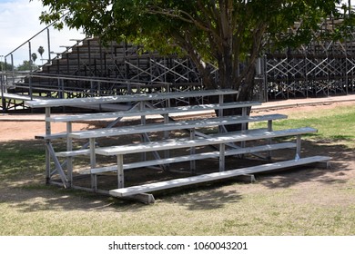 Small Metal Bleacher Next To Large Bleacher