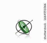 Small metallic object, a gyroscope or spinning wheel with a green patterned centre.