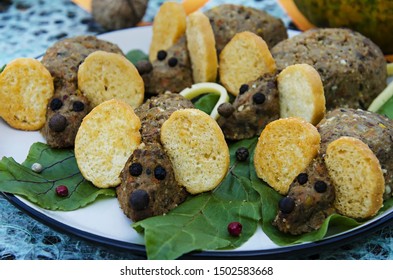 Small Mice From Meatloaf With Ears Of Crackers And Tails Of Cheese On A Light Plate. Menu For Halloween. Fun Food. Food Kids.