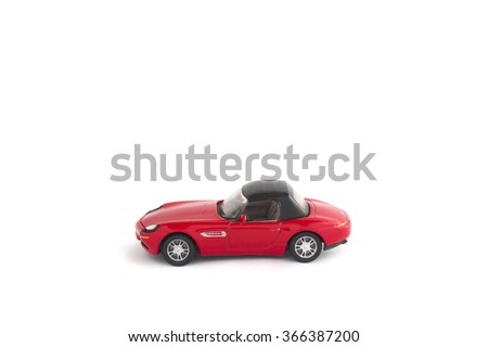 Small model of red bmw isolated on white background