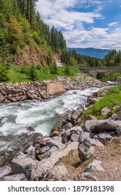 Small Mountain Creek In Vancouver, Canada. View With Mountain Background.