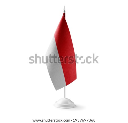 Small national flag of the Indonesia on a white background