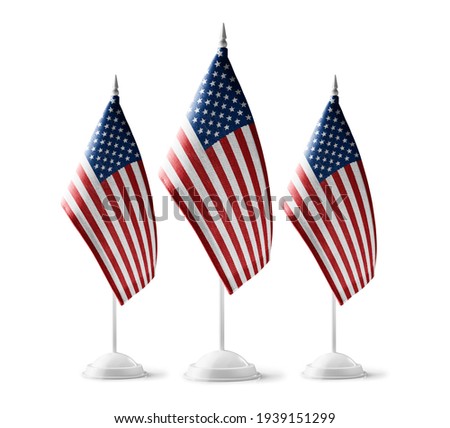 Small national flags of the United States on a white background