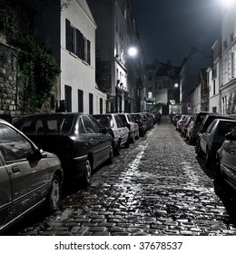 Small Night Street With Car Parking On Montmartre, Paris.