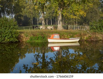 Small Old Boat On The River Dender In Flanders In Rural Side      