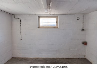 Small old cellar room with a cellar window in the cellar of the house