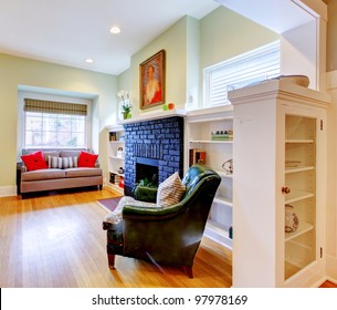 Small Old House Classic Living Room Interior With Black Fireplace.