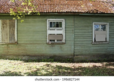 Small Old Wooden House With Closed Plywood Windows In The Latvian Village Of Kemeri On May 27, 2020.