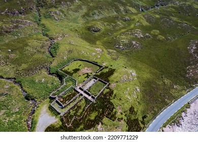 Small Open Sheep Farm In Connemara, Ireland. Traditional Stone Walls And Green Fields. Agriculture Industry. Wool Production. Aerial View.