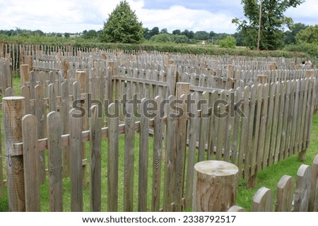 Small outdoor childrens wooden fence maze