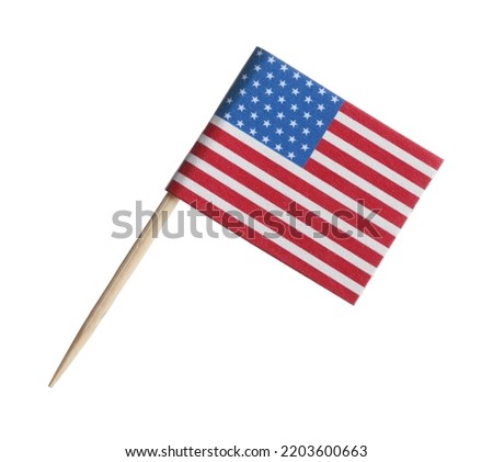 Small paper flag of USA isolated on white