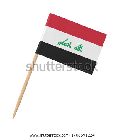 Small paper Iraqi flag on wooden stick, isolated on white