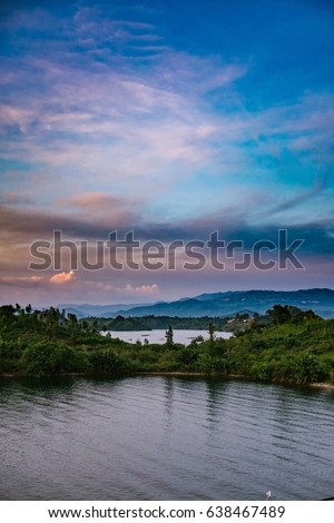 A small patch of land separates two coves of Lake Kivu, near Kibuye, Rwanda