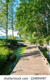 small path pedestrian space by the lake in morning 