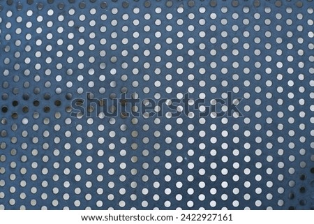 Small perforated steel plate background