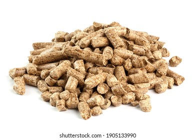 Small pile of pressed wooden sawdust pellets isolated on white background. Biofuel and pet litter, mulch.