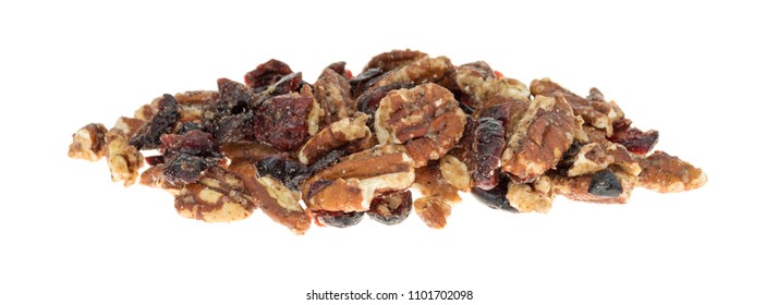 A Small Pile Of Sugar Glazed Pecans Isolated On A White Background.