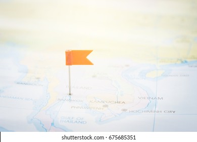 Small pin flag sticking on map at Bangkok, Thailand, travel tourism and journey concept  