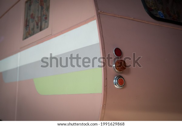 Small pink vintage\
caravan for holidays