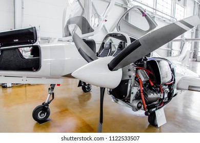 A Small Plane In The Hangar On Repair