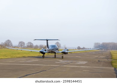 small plane on the runway