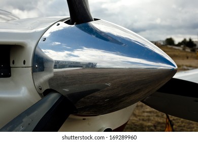 Small Plane Propeller Closeup Against Blue Sky 