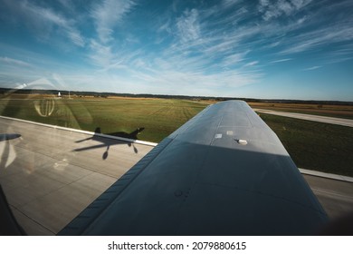 Small Plane Taking Off, Shadow