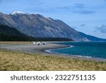 Small planes parked on the beach at Chinitna Bay in Lake Clark National Park, ecotourism in Alaska
