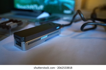 Small portable DNA flow cell sequencer, closeup shallow depth of field detail