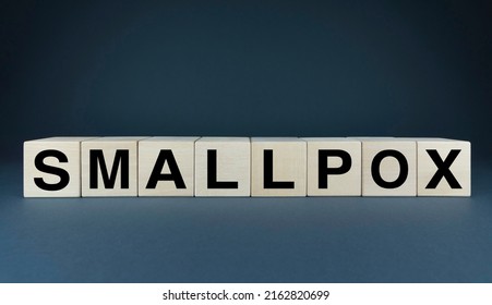 Small Pox. Cubes Form The Word Smallpox. Smallpox And Monkeypox Virus Concept